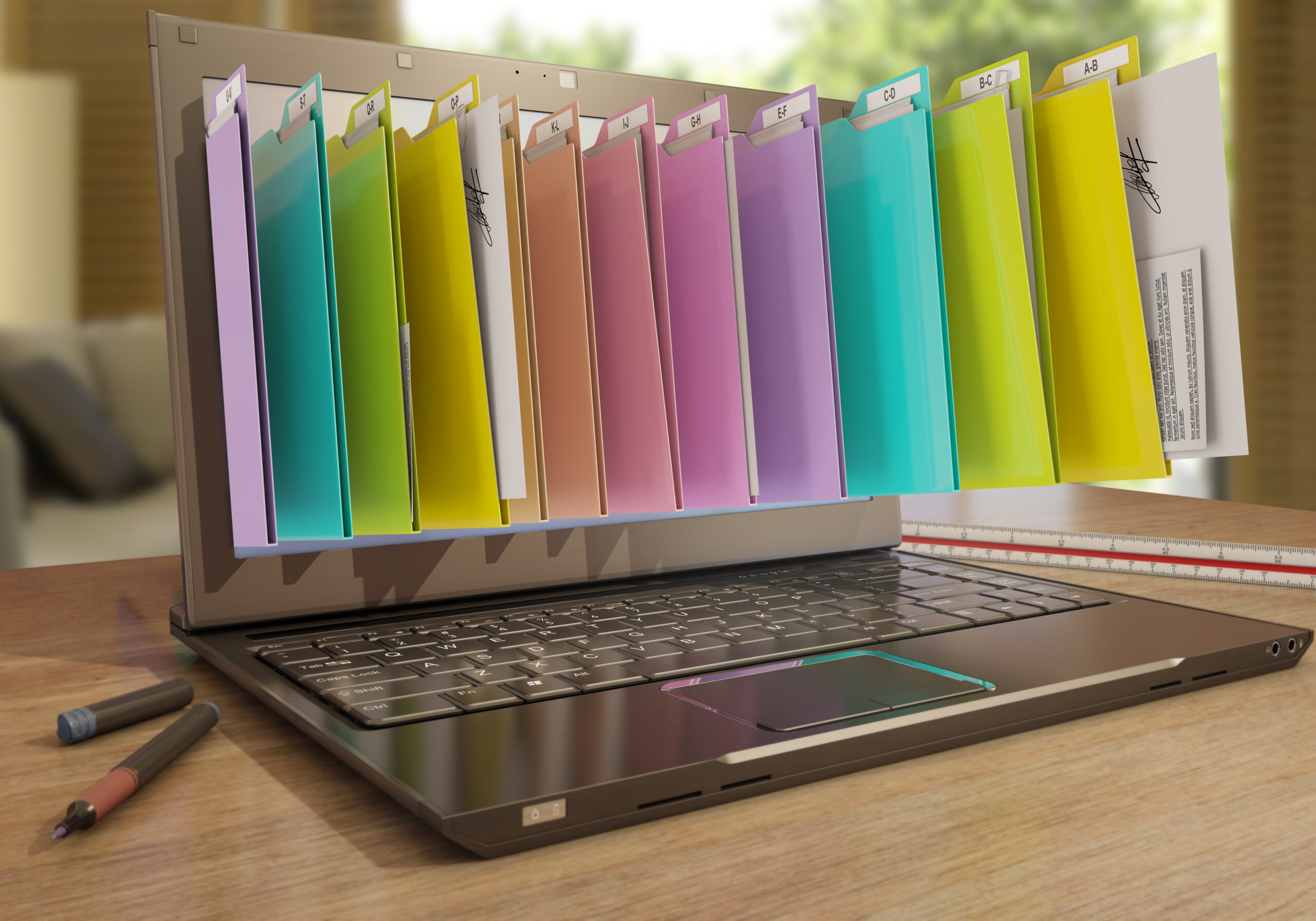 organizing digital organizing files on a laptop
